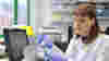 Researcher working with medical equipment in the lab