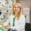 Female researcher standing in a lab