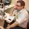 Professor Pearse Keane consulting with a patient