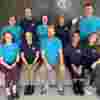 A group of Fight for Sight team members wearing branded t shirts